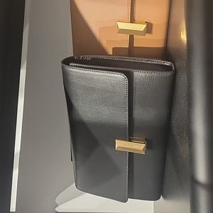 Small cute Leather Purses in 4 colors. Black, Navy Blue, Medium Brown and Beige.